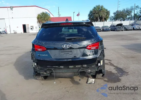 2014 Hyundai Santa Fe Sport 2.4L z USA, uszkodzony, nr VIN 5XYZUDLB7EG209088